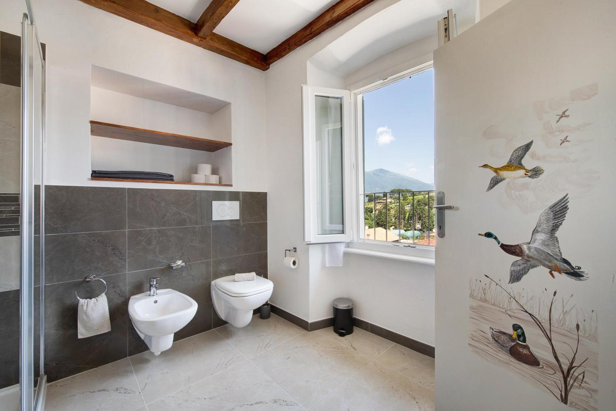 Taronico Apartments Duck ベッラージョ エクステリア 写真